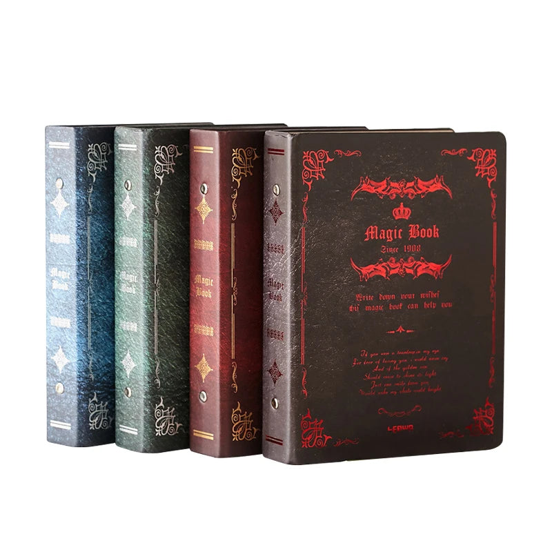 Warm wooden desk with fountain pens and linen journals